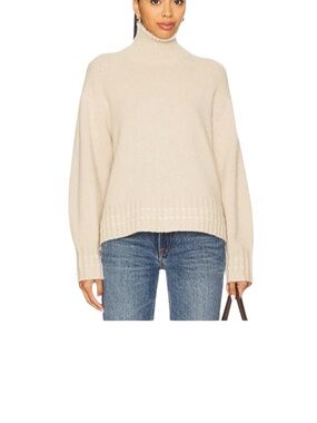 Revolve Autumn Cashmere Funnel neck sweater in stone .